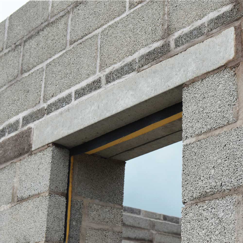 A lintel fixed above a window opening.